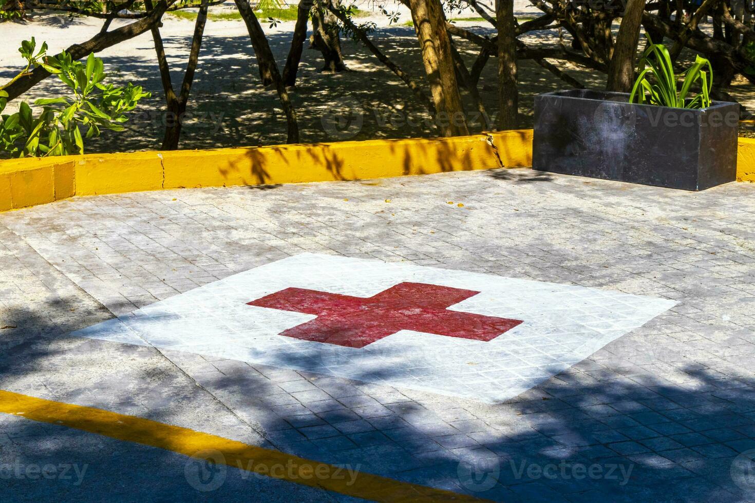 Red Cross sign Sign and symbol at parking lot Mexico. photo