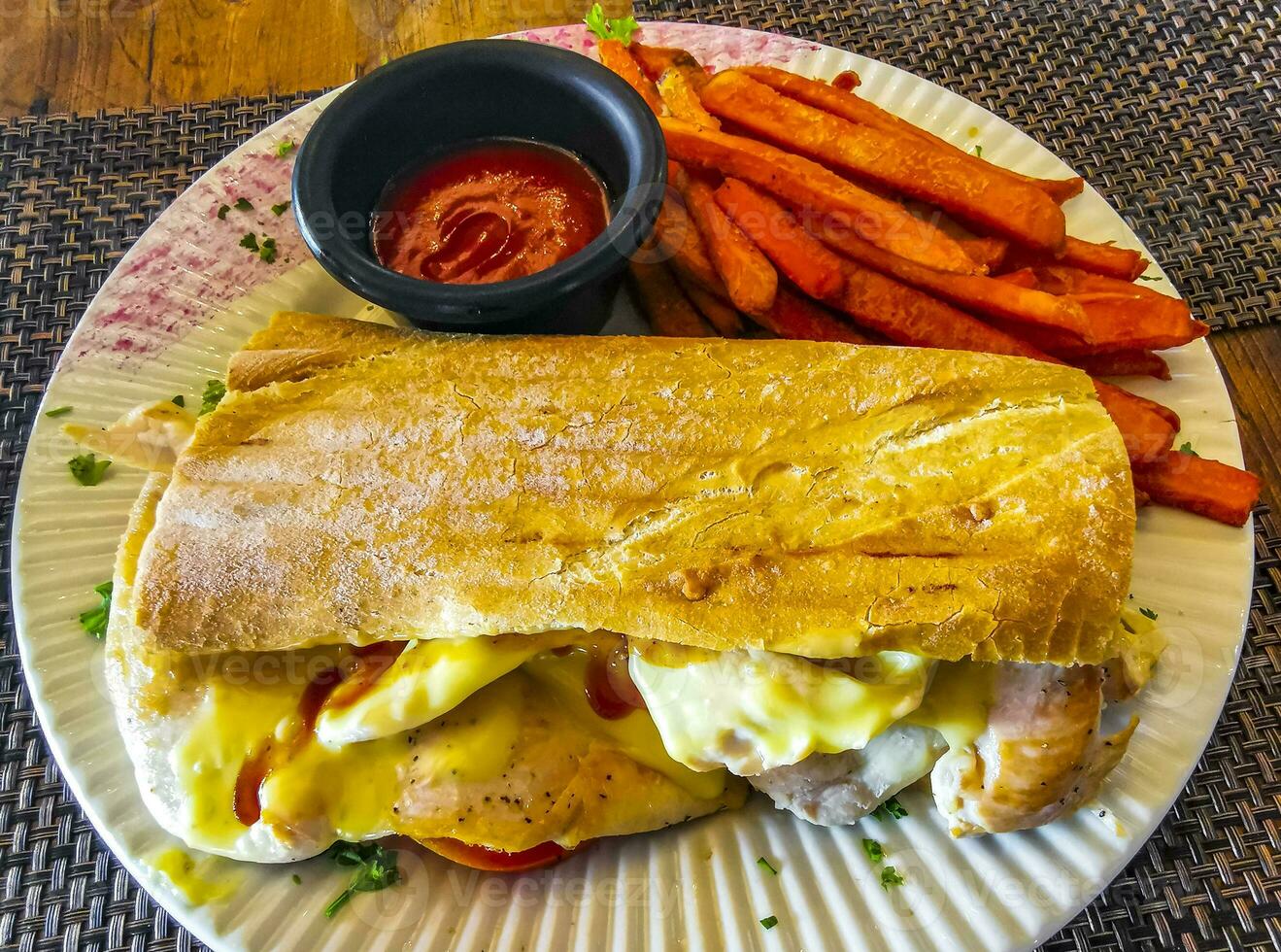 Baguette sandwich toast bread with chicken tomato salad potatoes fries. photo