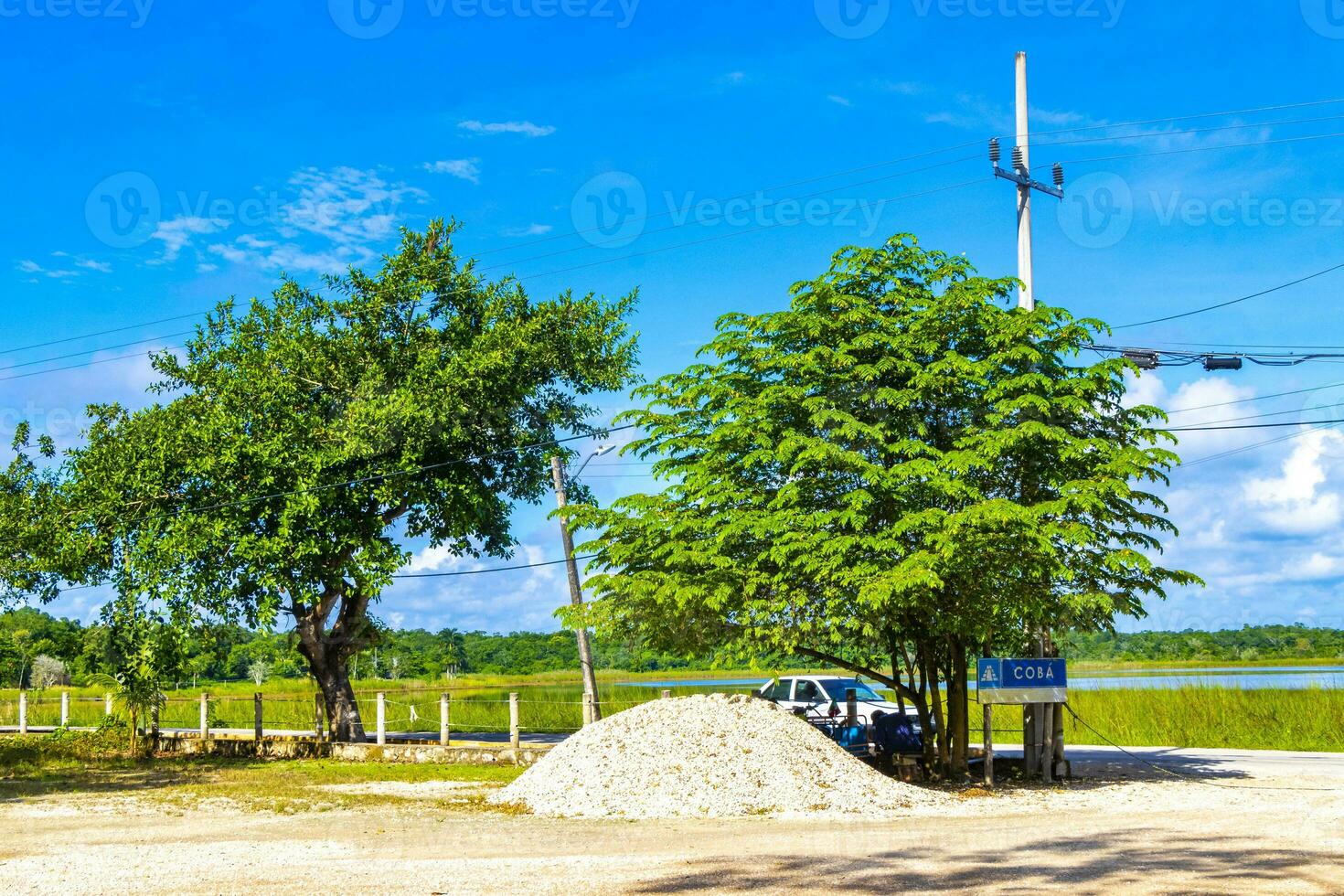 Coba Maya Ruins ancient buildings pyramids entrance welcome sign Mexico. photo