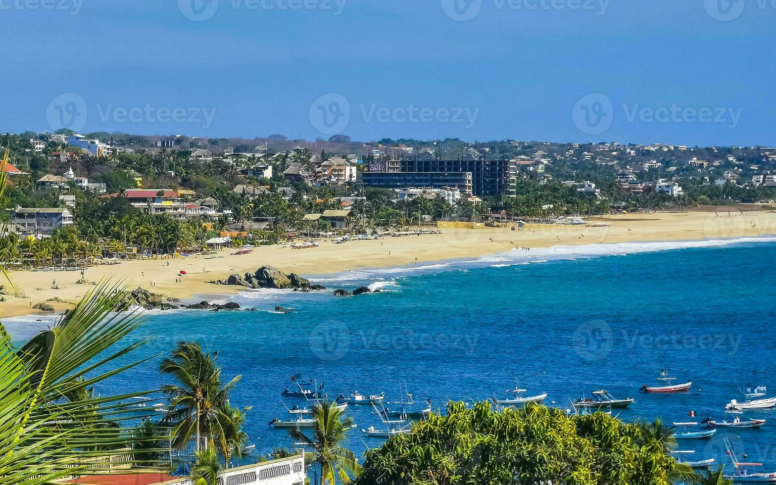 Sun beach sand surfer waves palms in Puerto Escondido Mexico. photo