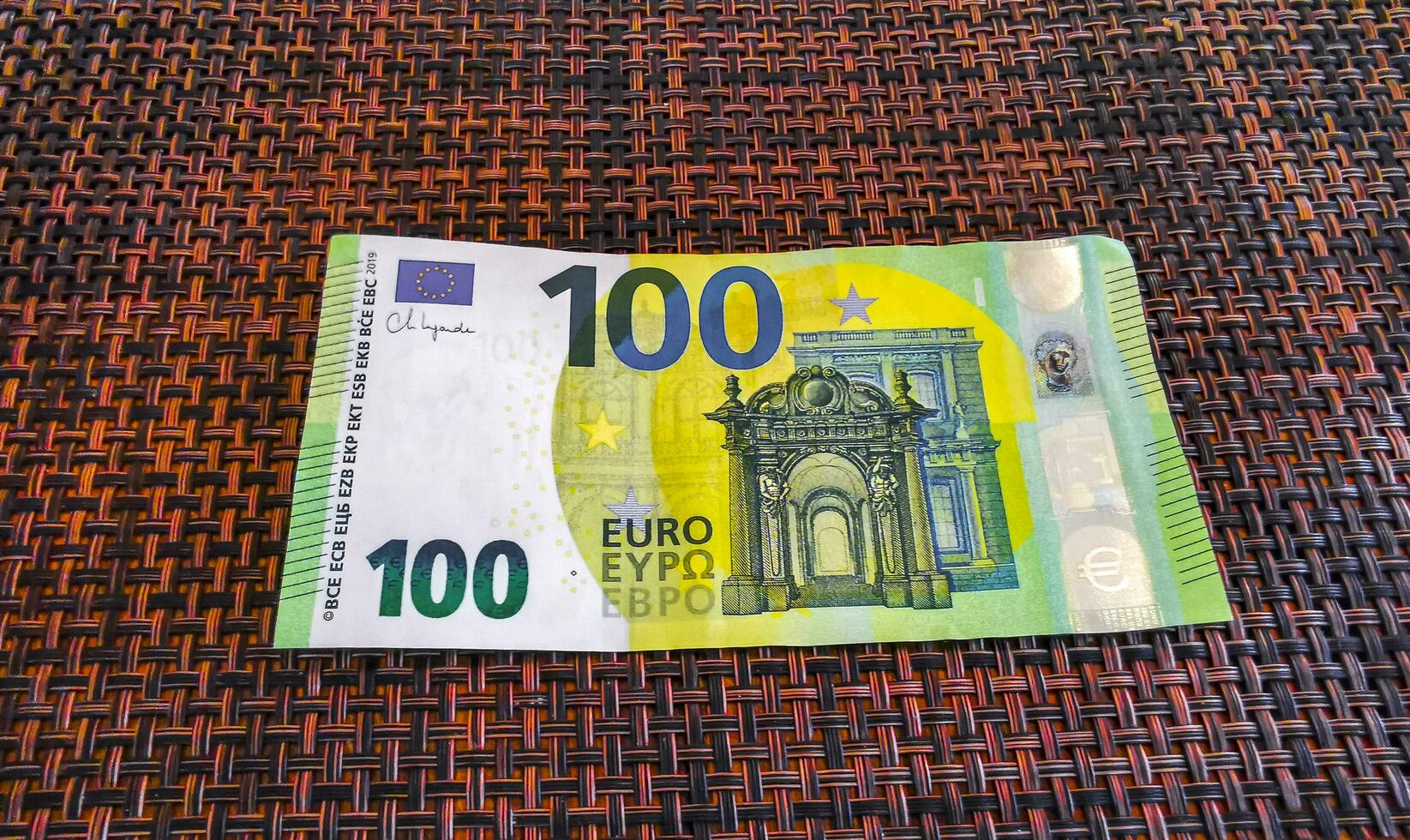 Playa del Carmen Quintana Roo Mexico 2023 Large green euro bill Money on the table. photo