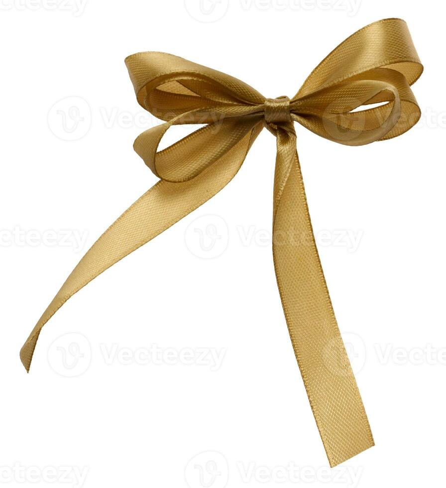 Tied bow made of golden silk ribbon on an isolated background photo