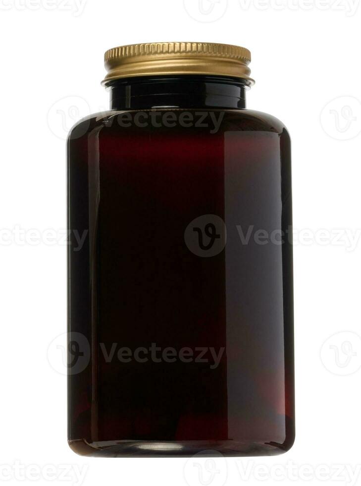 Brown plastic bottle with a metal cap for medicines, ointments on an isolated background photo