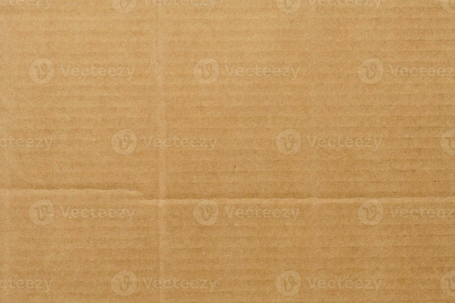 Brown corrugated cardboard texture, full frame photo