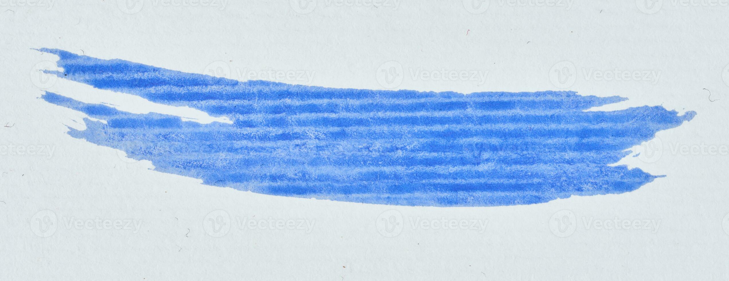 Watercolor brush stroke of blue paint, on a white  background photo