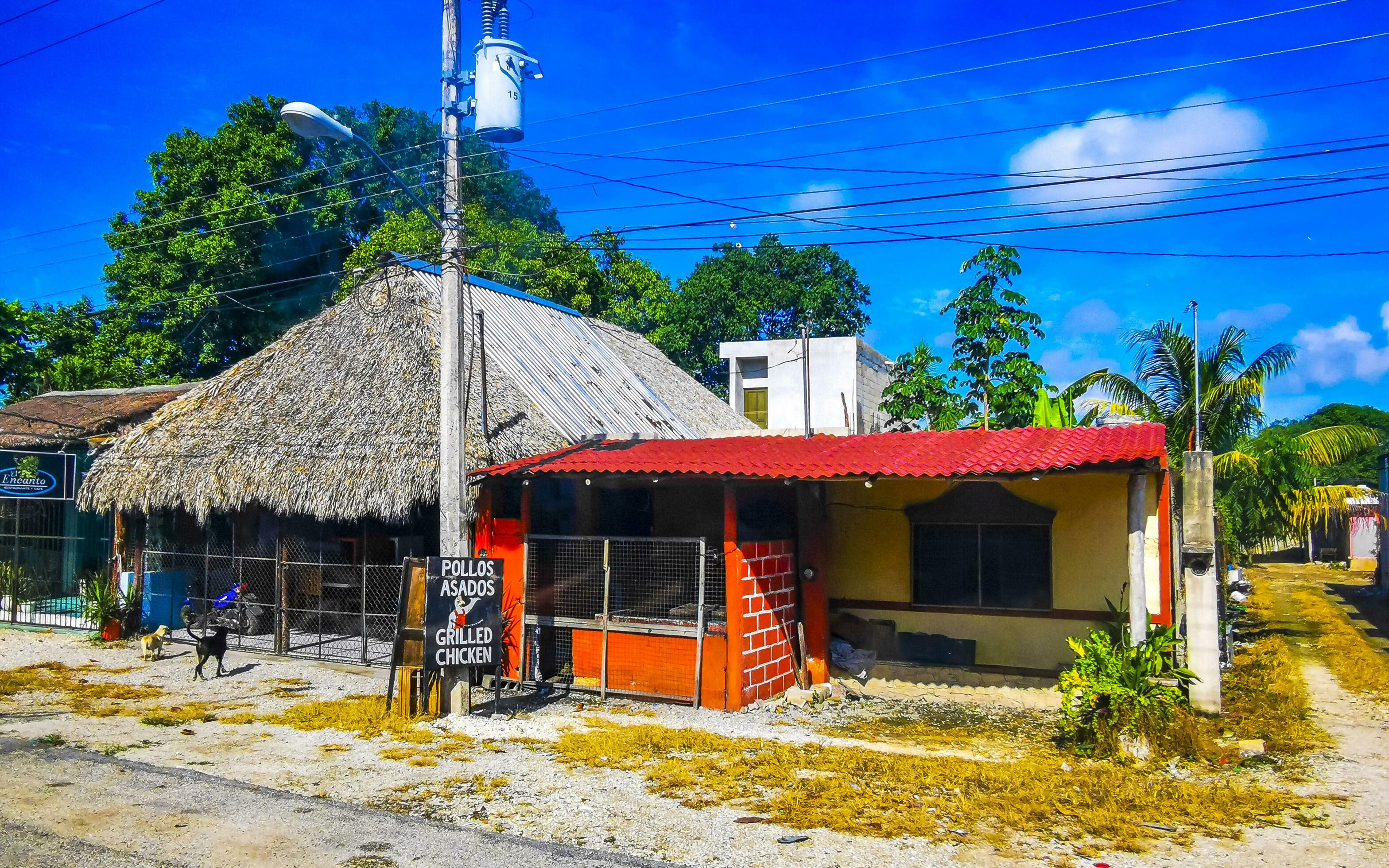 Tulum Quintan Roo Mexico 2023 Typical colorful street road traffic cars