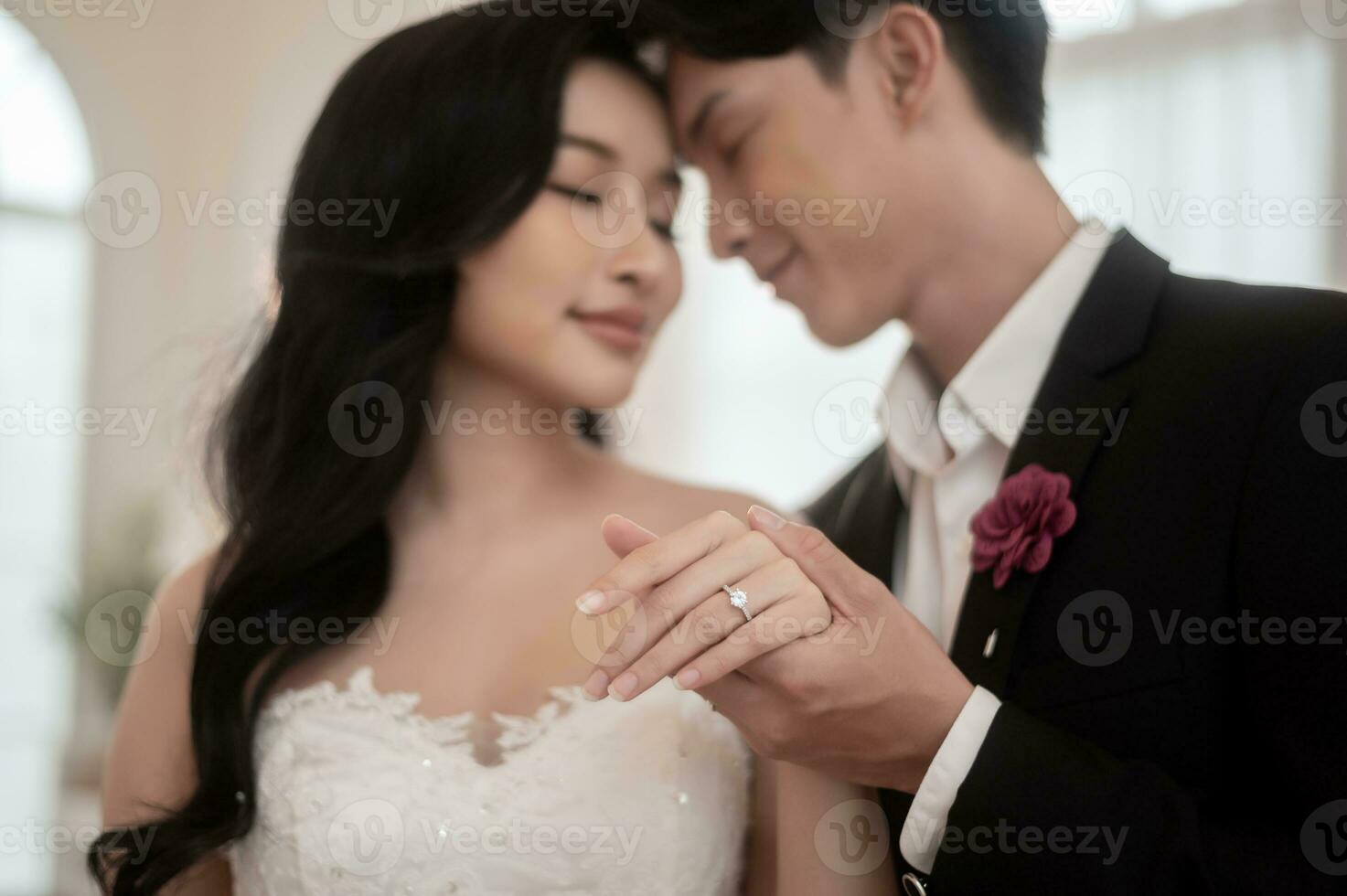 Couple of bride and groom enjoying romantic moments in wedding ceremony, Love, celebration and marriage. photo