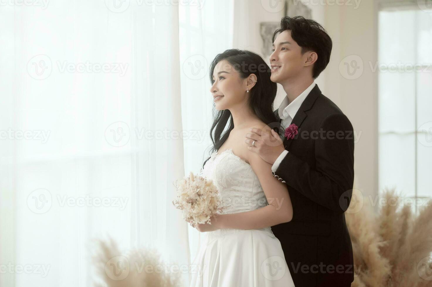 Couple of bride and groom enjoying romantic moments in wedding ceremony, Love, celebration and marriage. photo