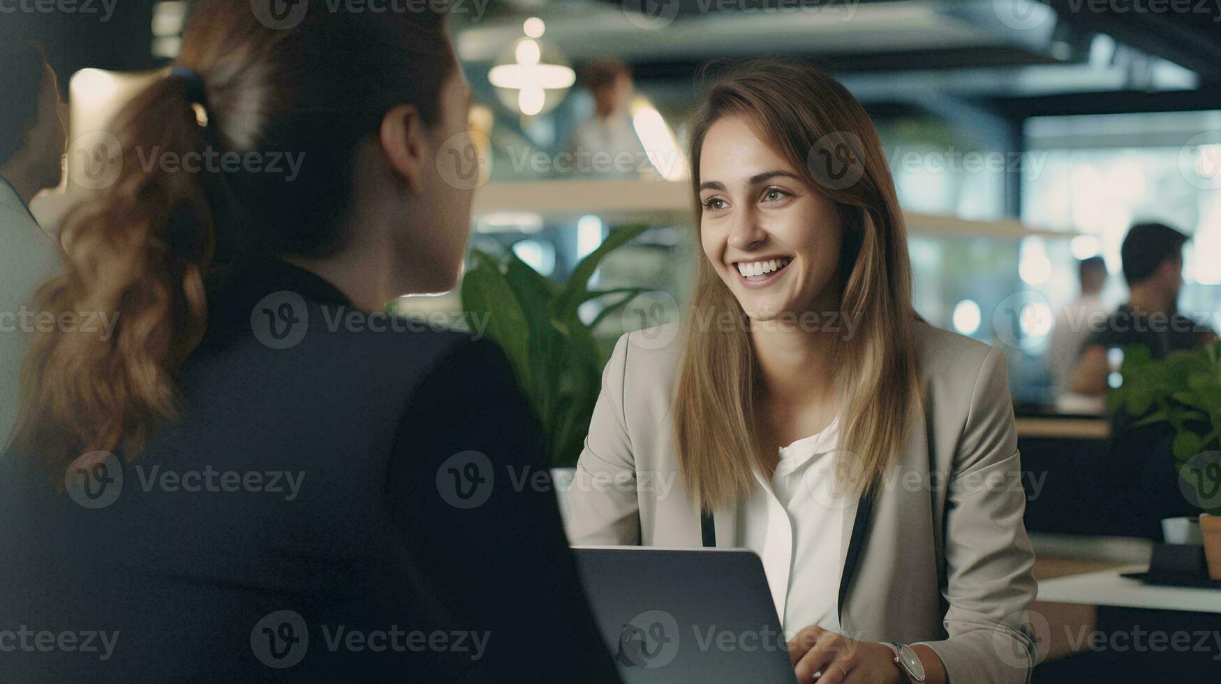 AI generated Female Manager Chats with Young Intern Specialist. Collaborate on Technology Projects photo