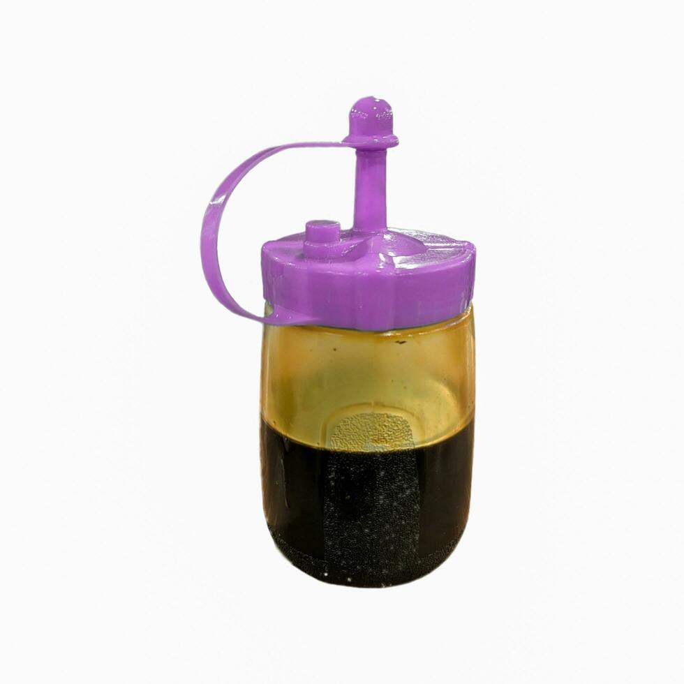 isolated pink soy sauce bottle photo