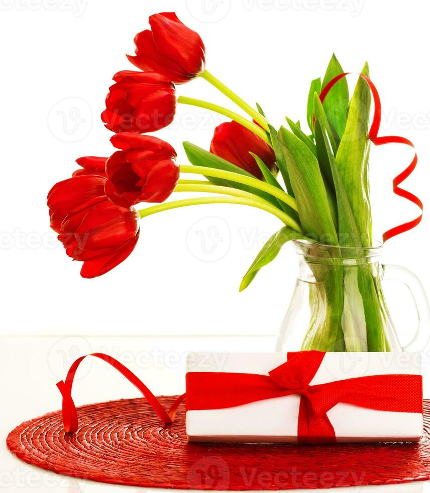 Red tulips and present box photo