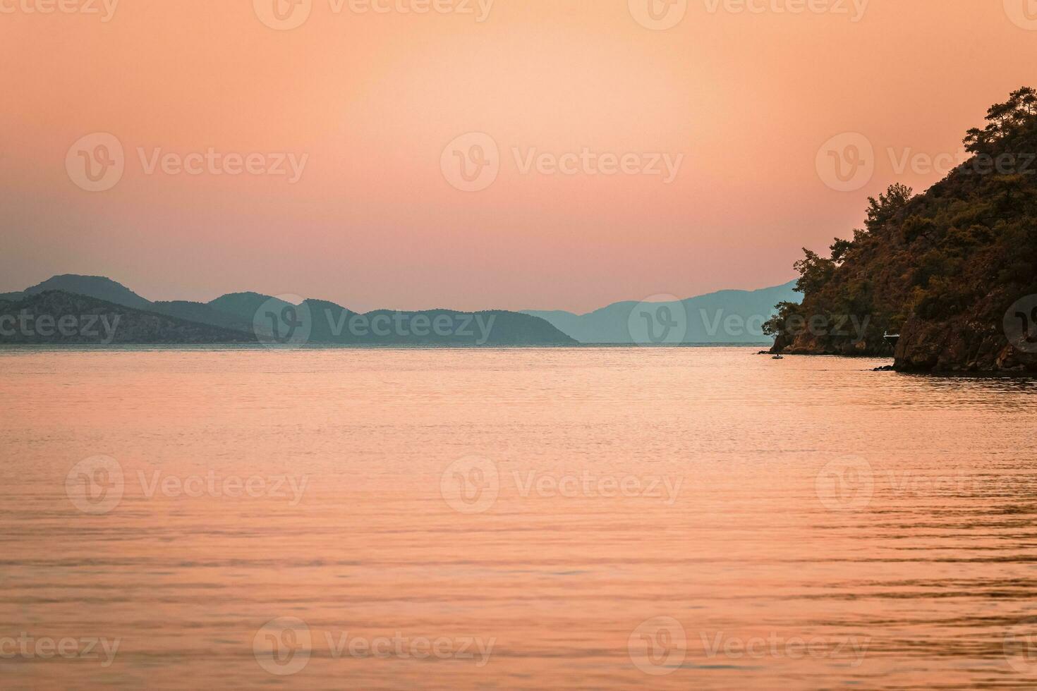 Beautiful orange sunset over sea photo