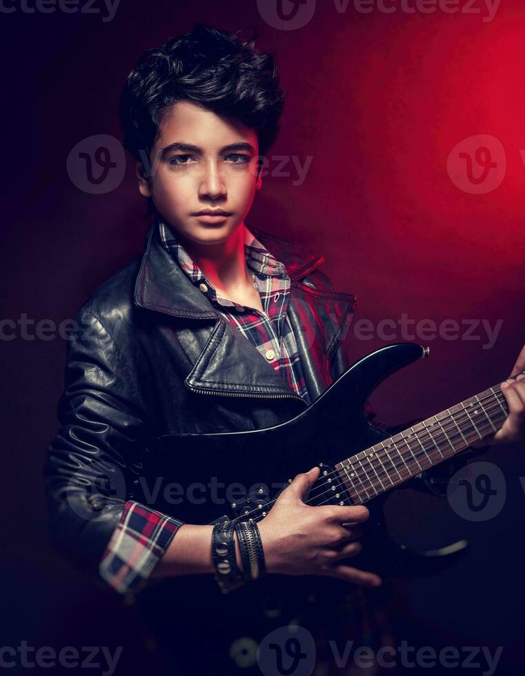 Handsome guy with guitar photo