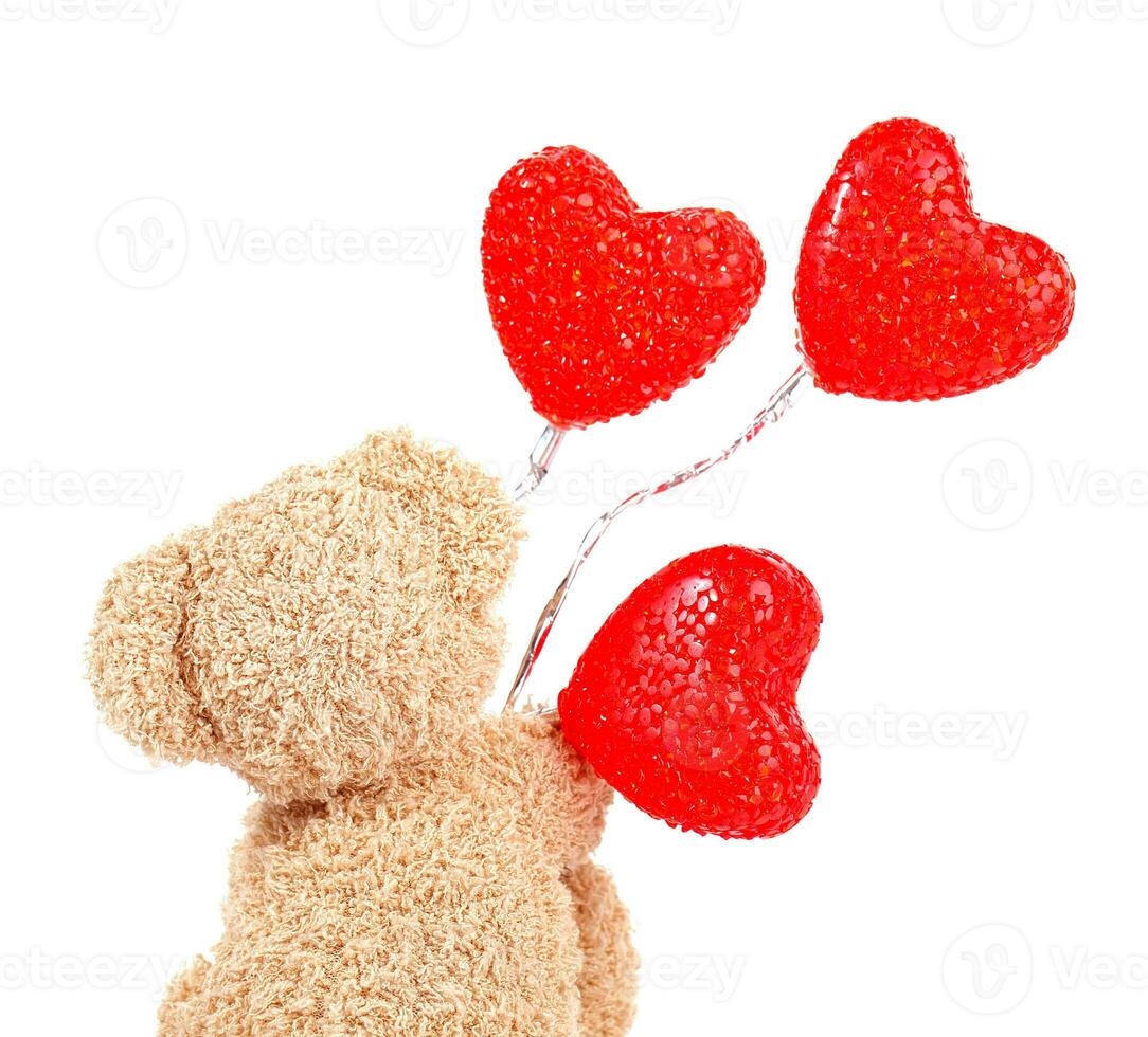 Teddy bear with red balloons photo