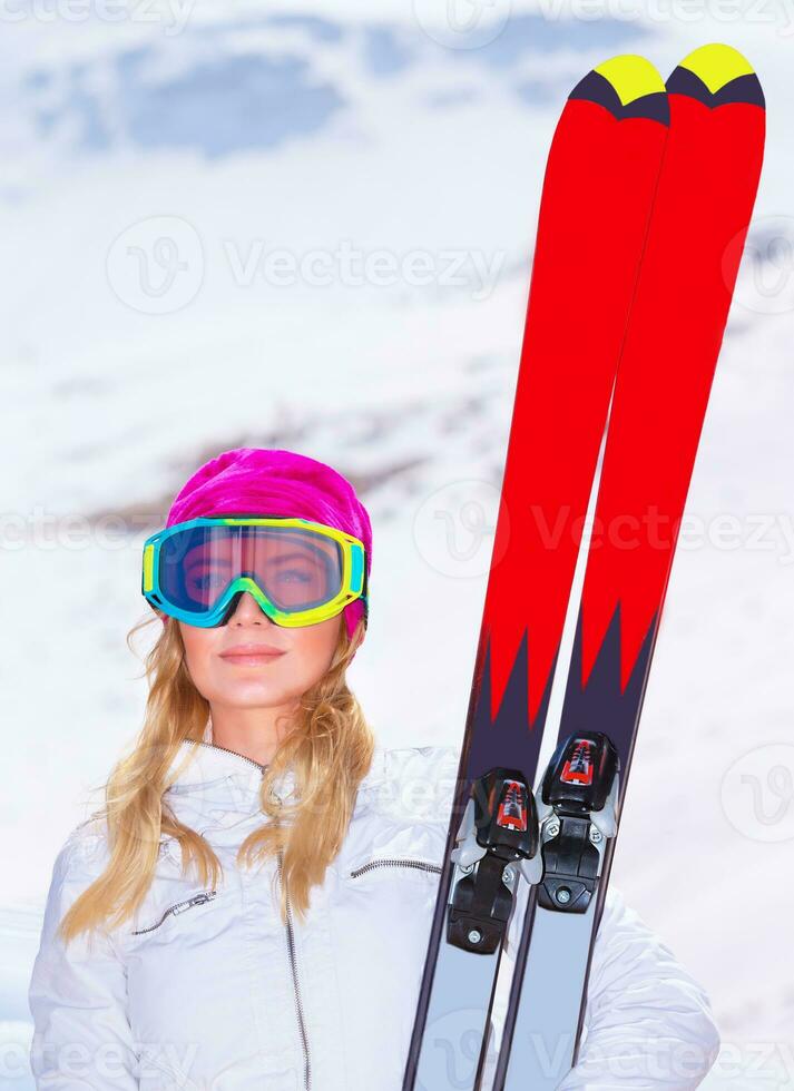 Sportive woman with ski photo