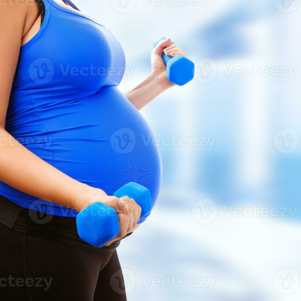 Pregnant female do exercise photo