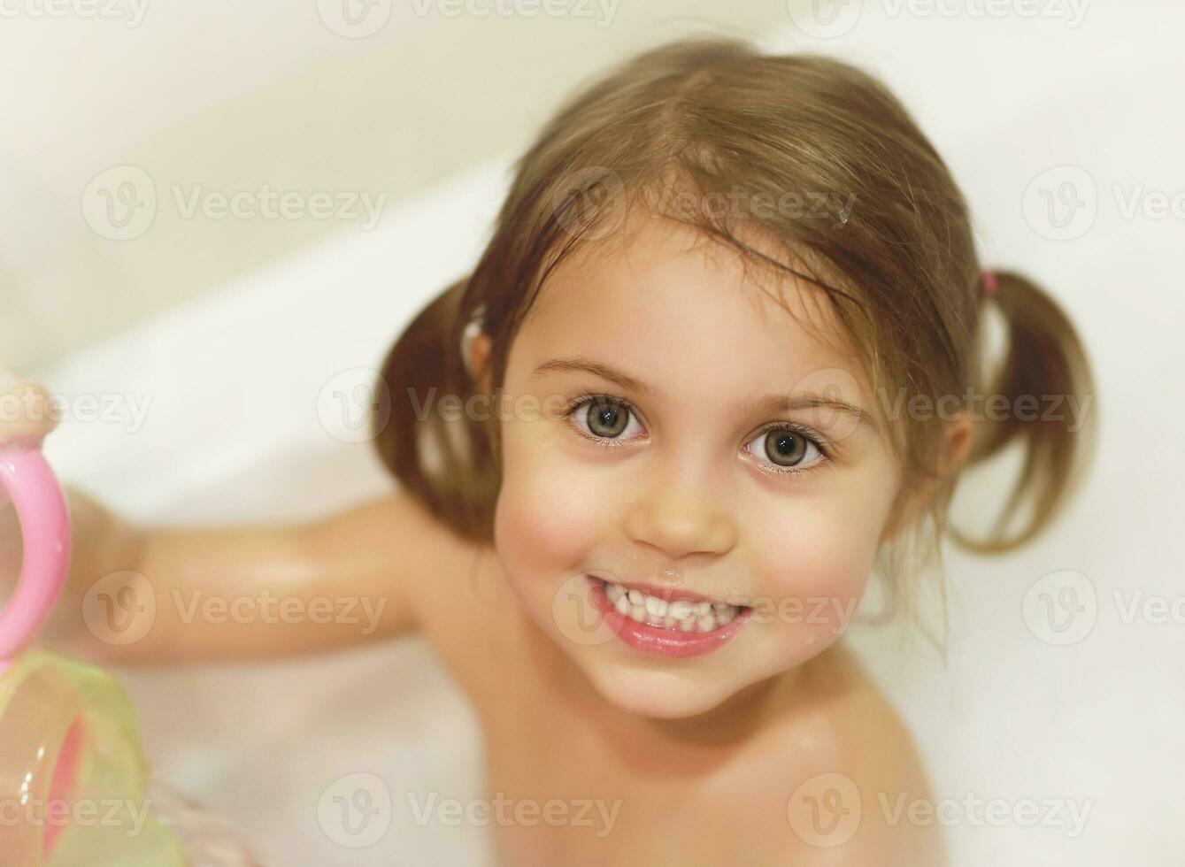 Little girl take bath photo