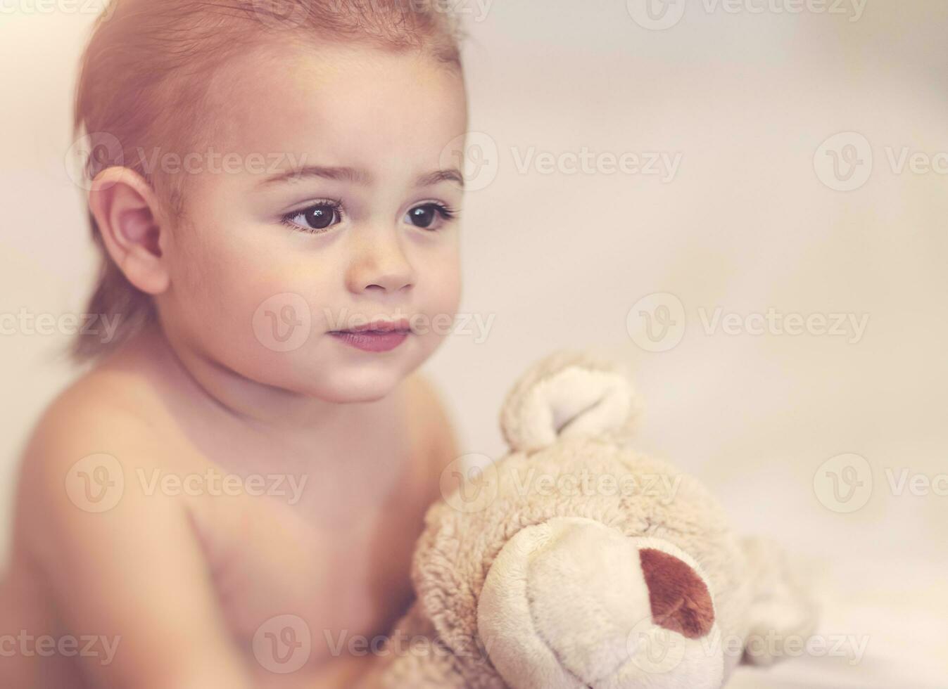 Little boy with soft toy photo