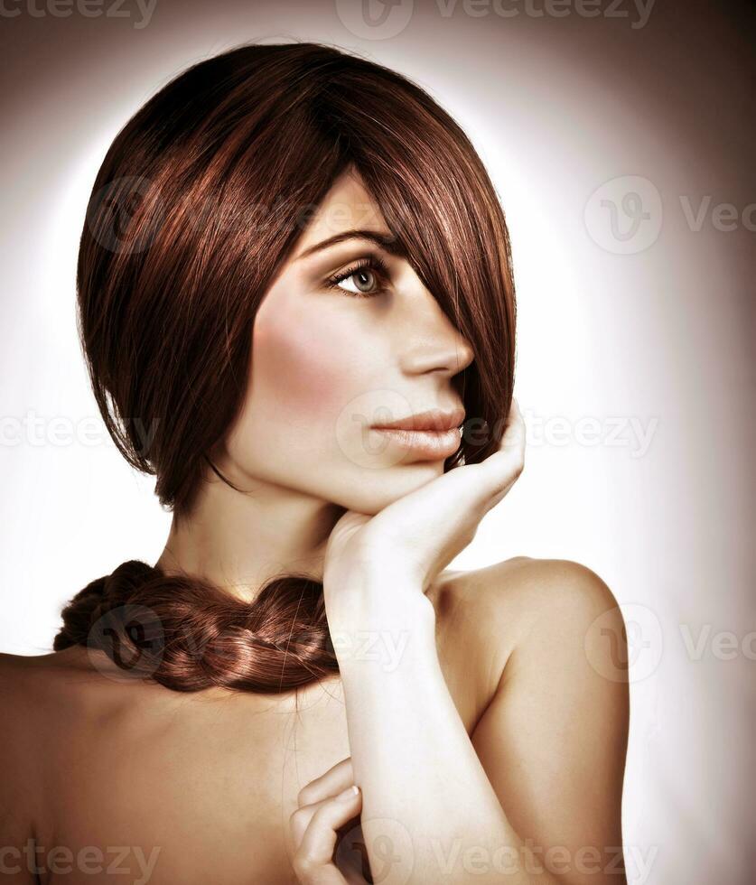 Elegant hairdo of beautiful woman photo