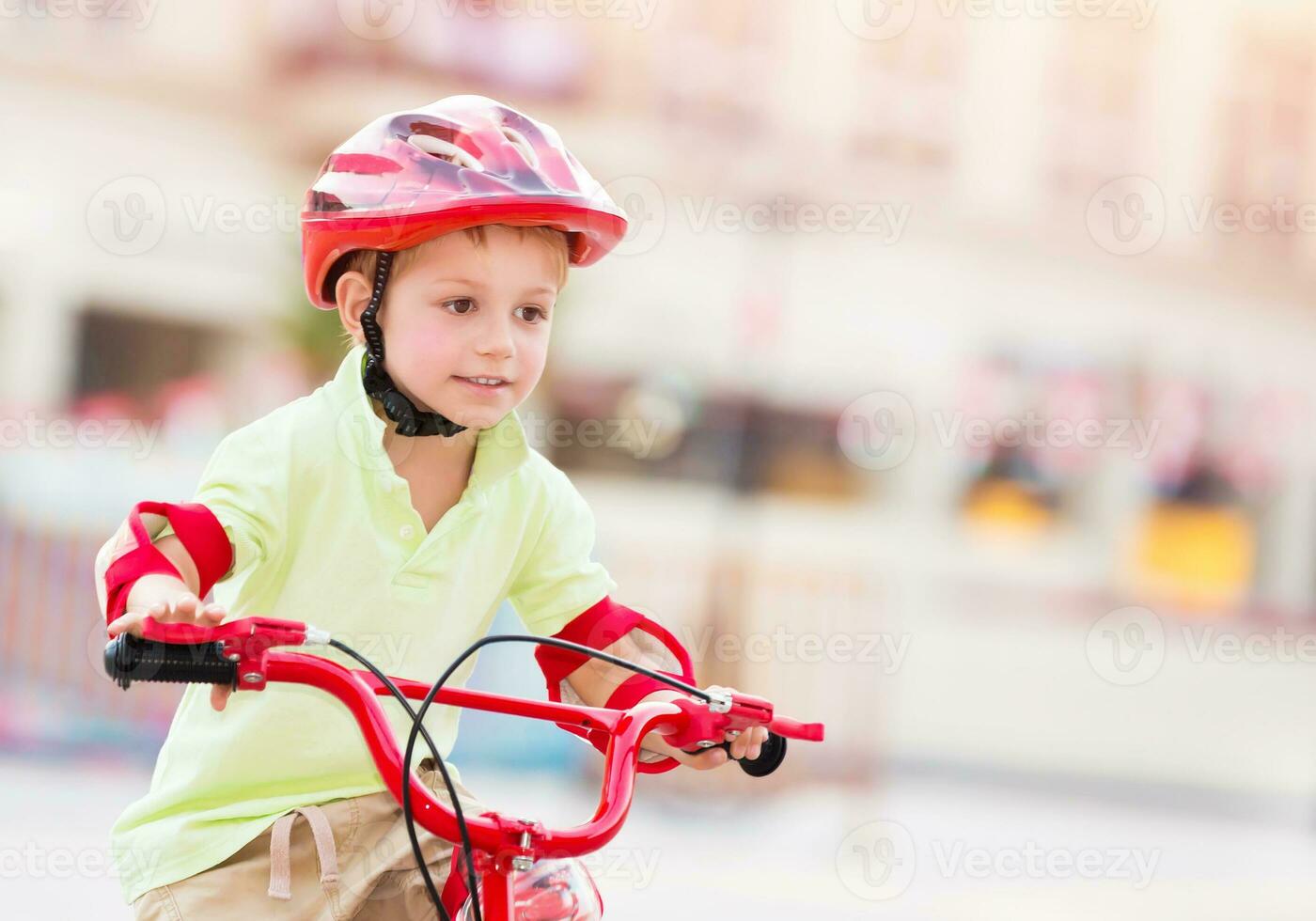 Little boy playing outdoors photo