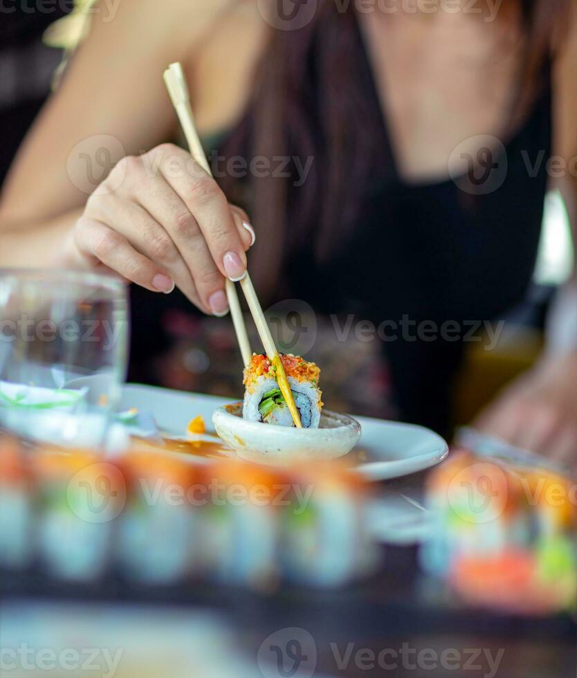 Enjoying sushi dinner photo