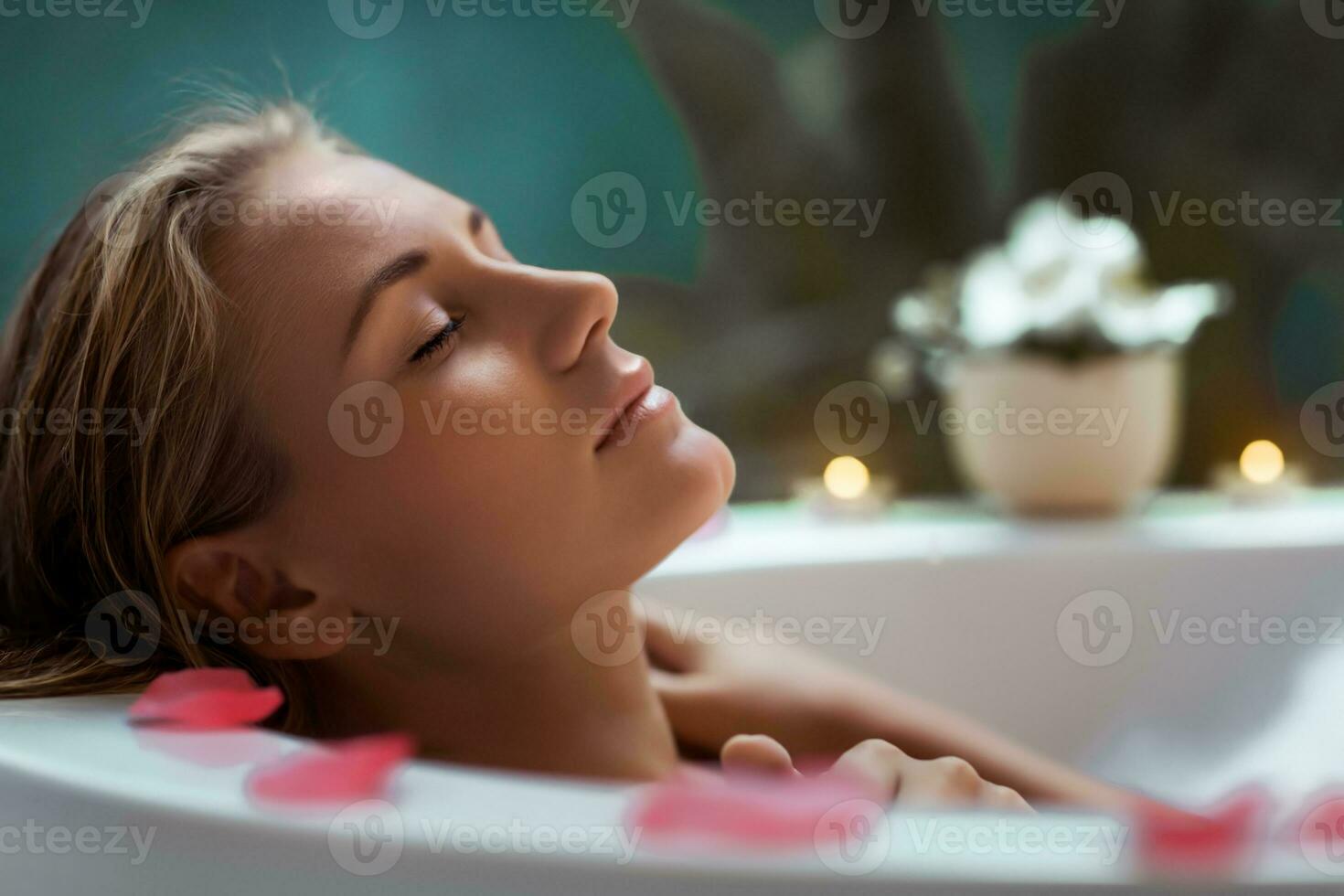 Pretty woman taking bath photo