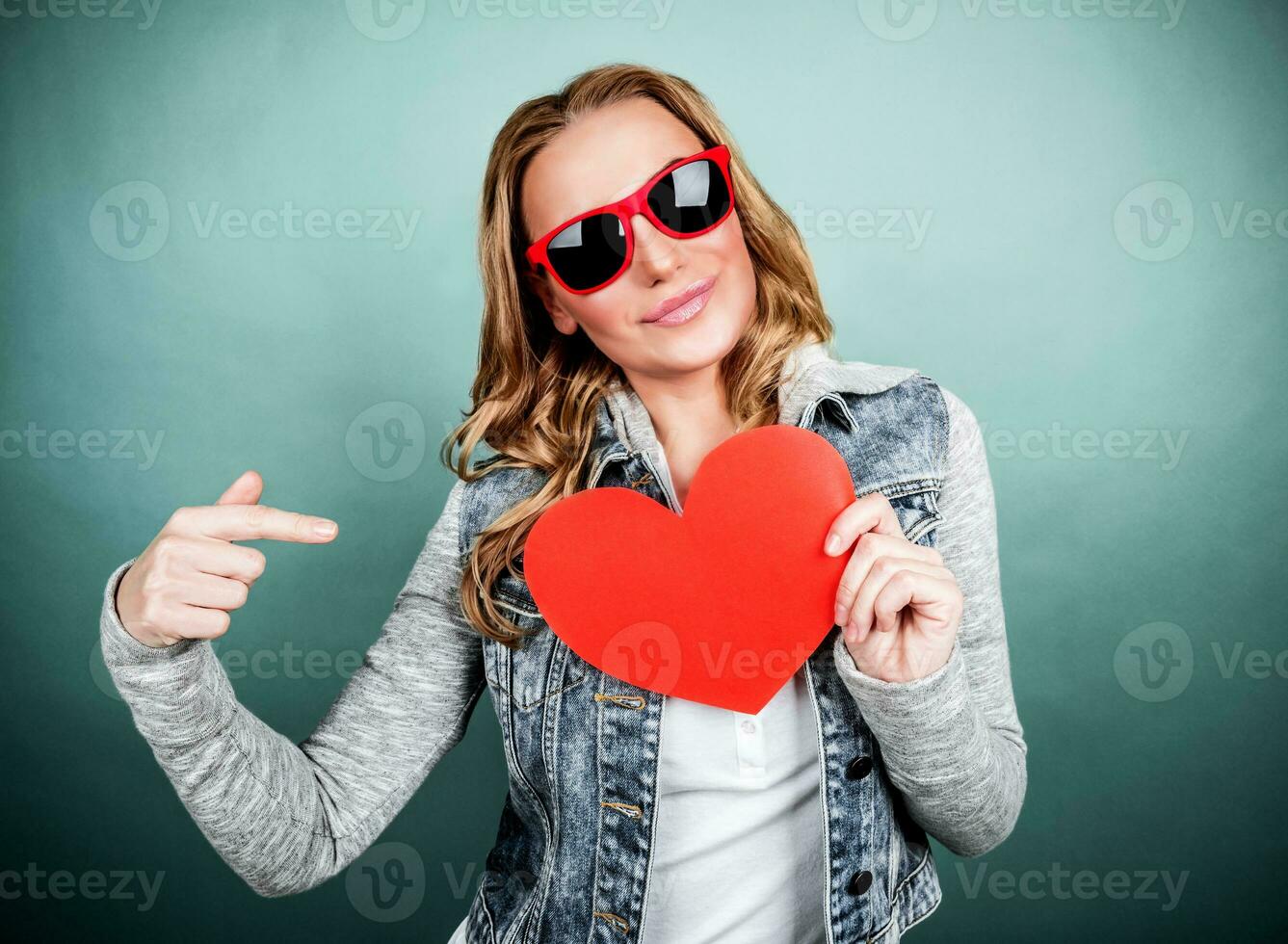 Woman with romantic postcard photo