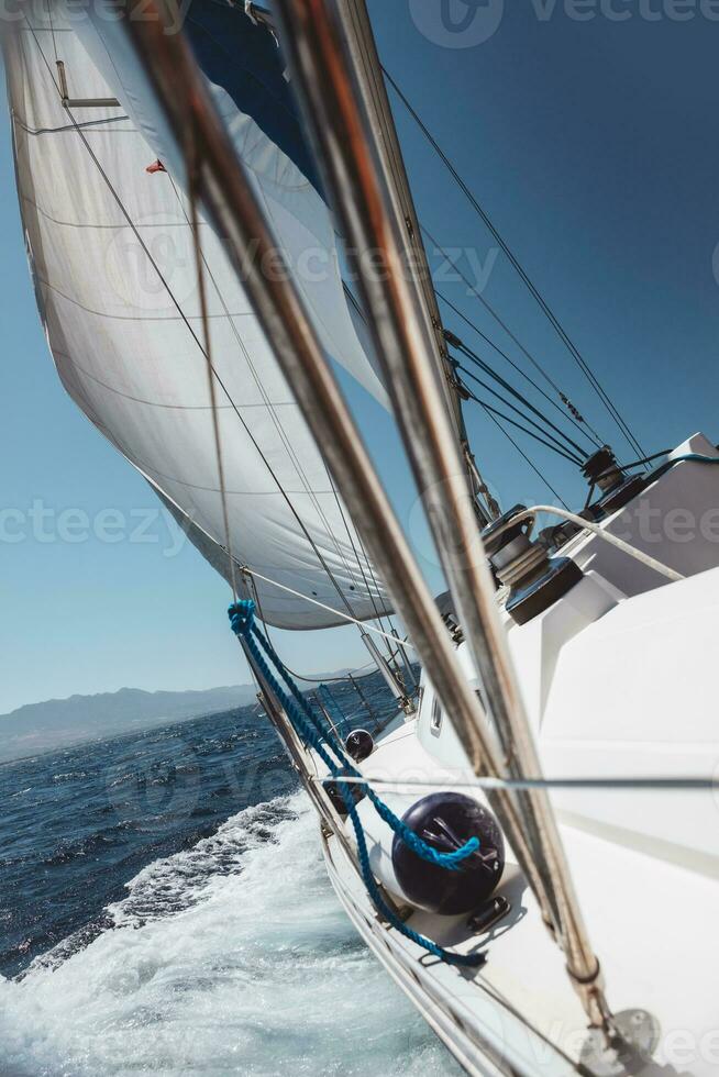 Traveling on sailboat in the sea photo