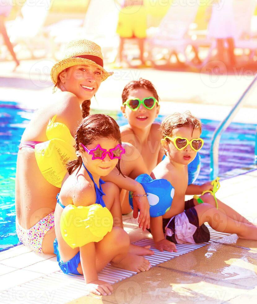Cheerful family on beach resort photo