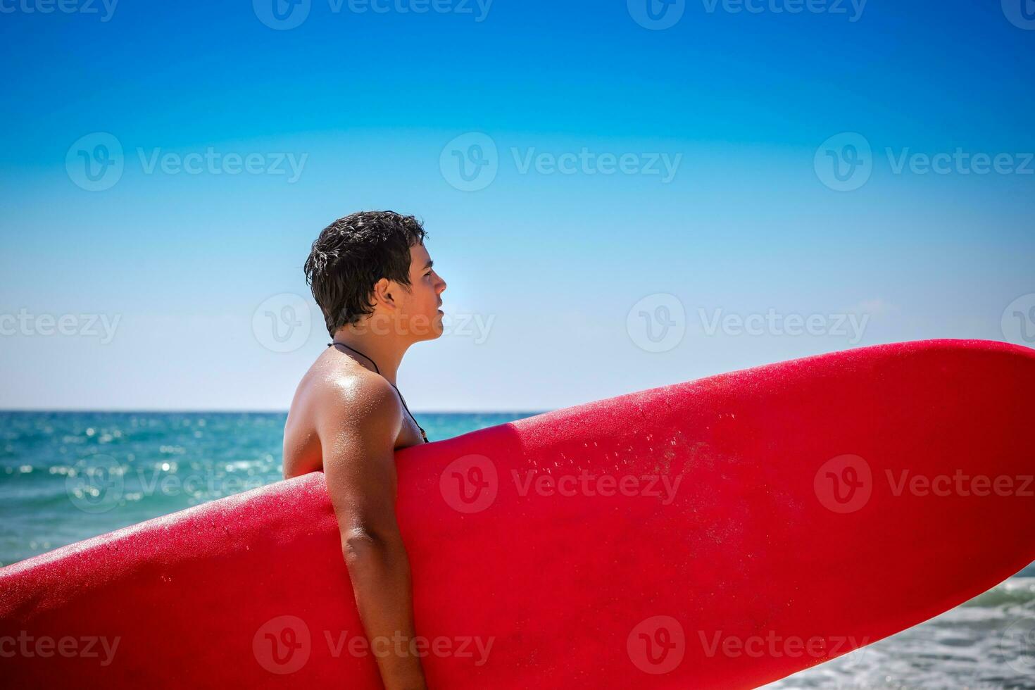 Surfer on the beach photo