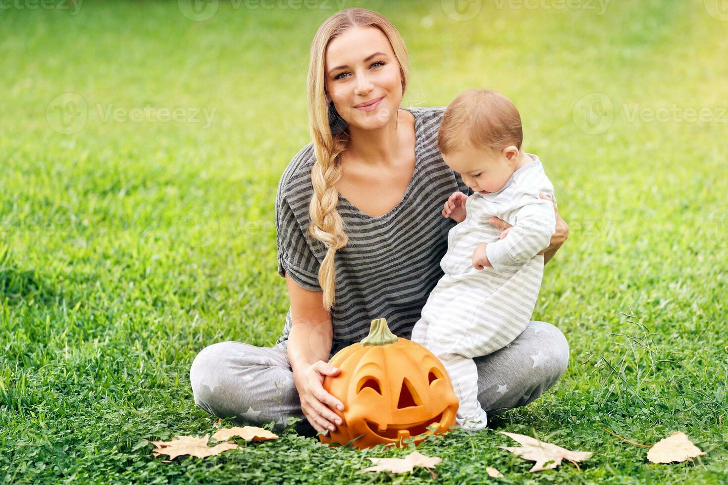 Happy family celebrating Halloween photo