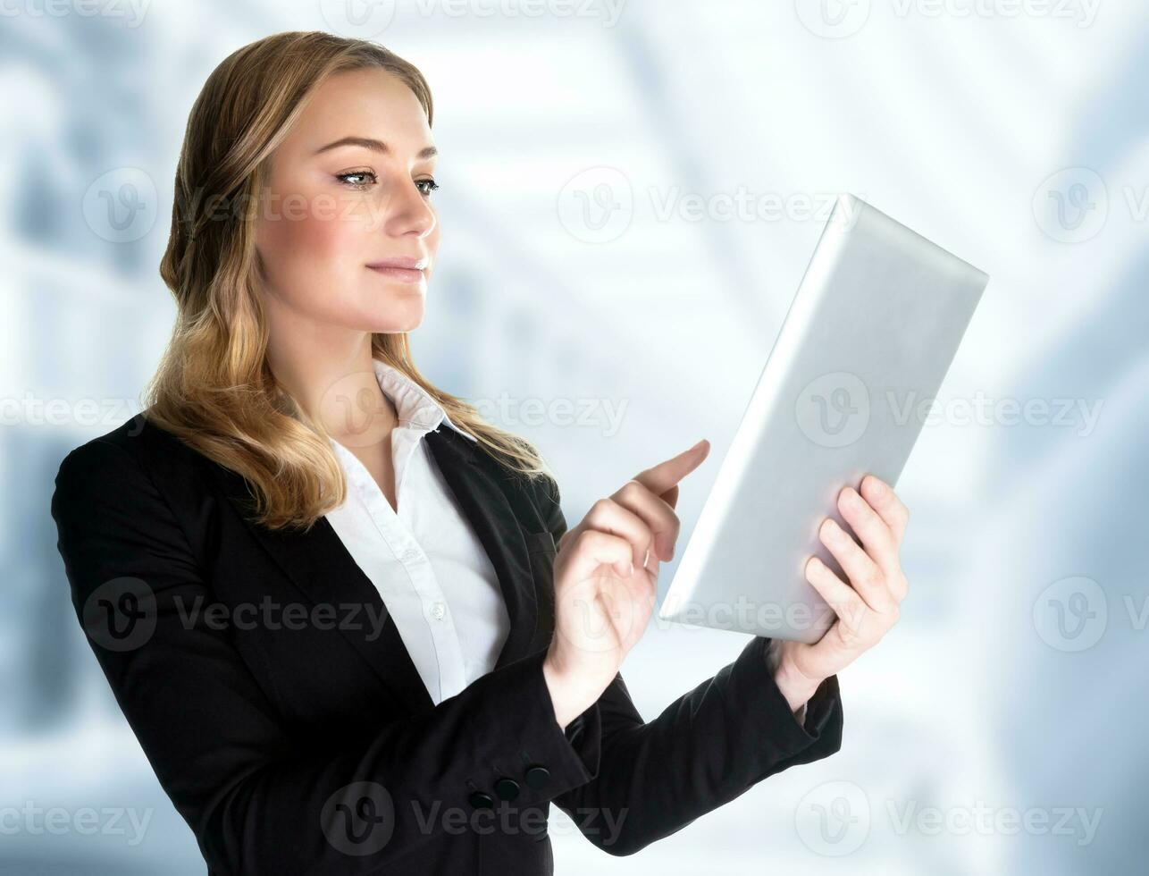 Business lady with touch pad photo