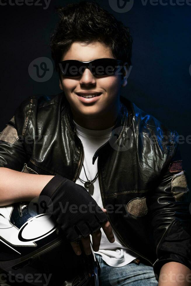 Stylish teen boy biker photo