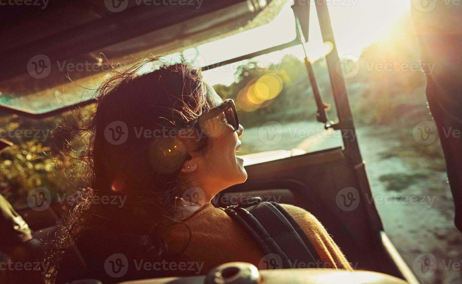 Happy woman on safari photo