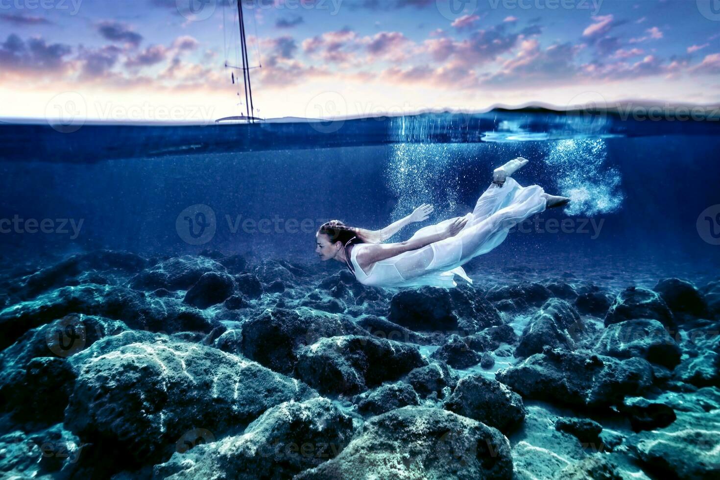 Dive in sunset time photo