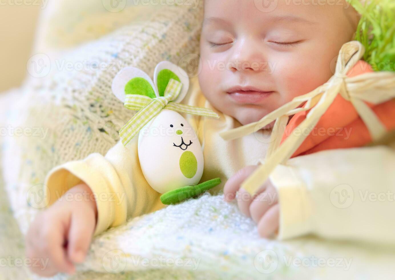 Baby boy with Easter bunny photo