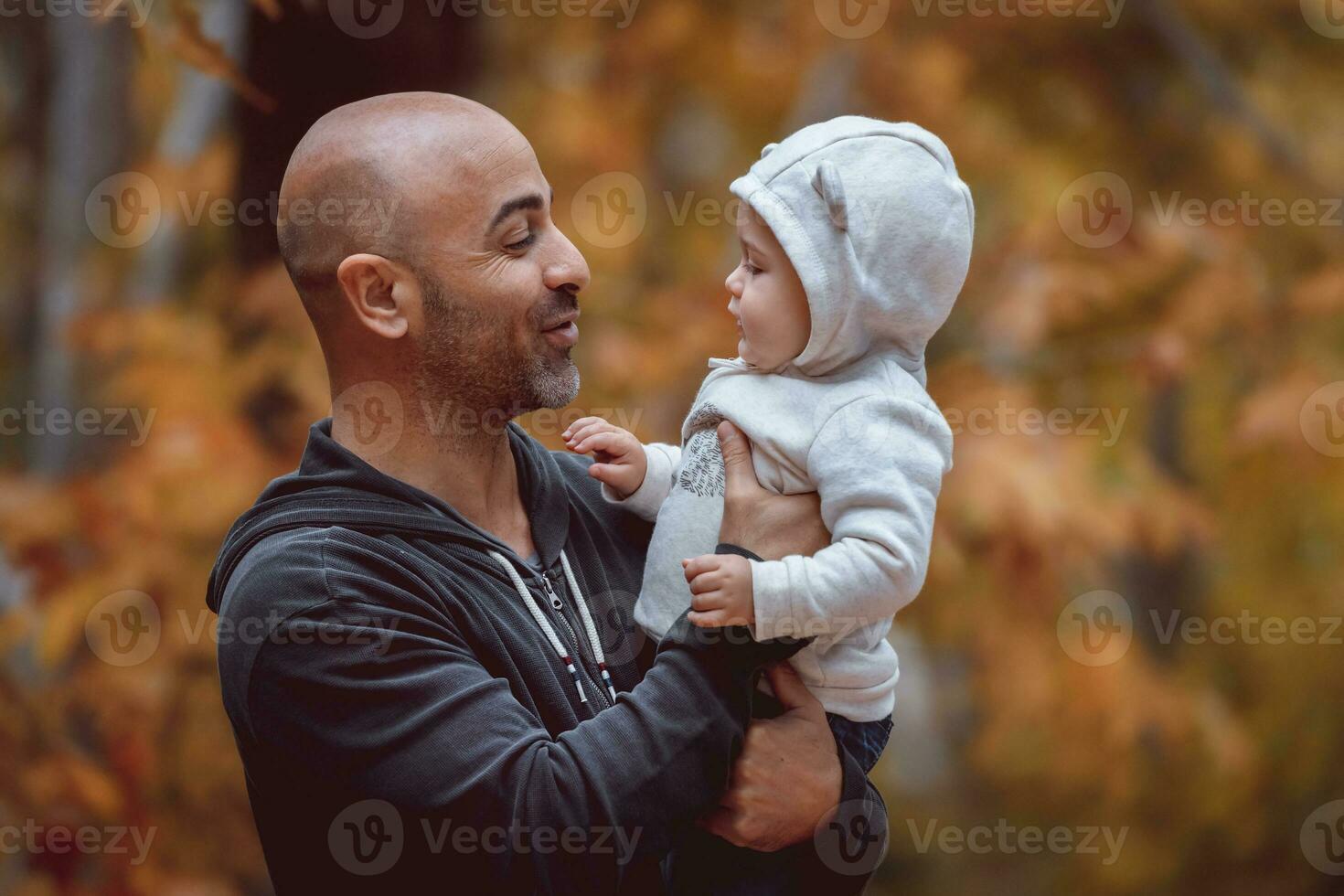 Portrait of a happy family in the park photo