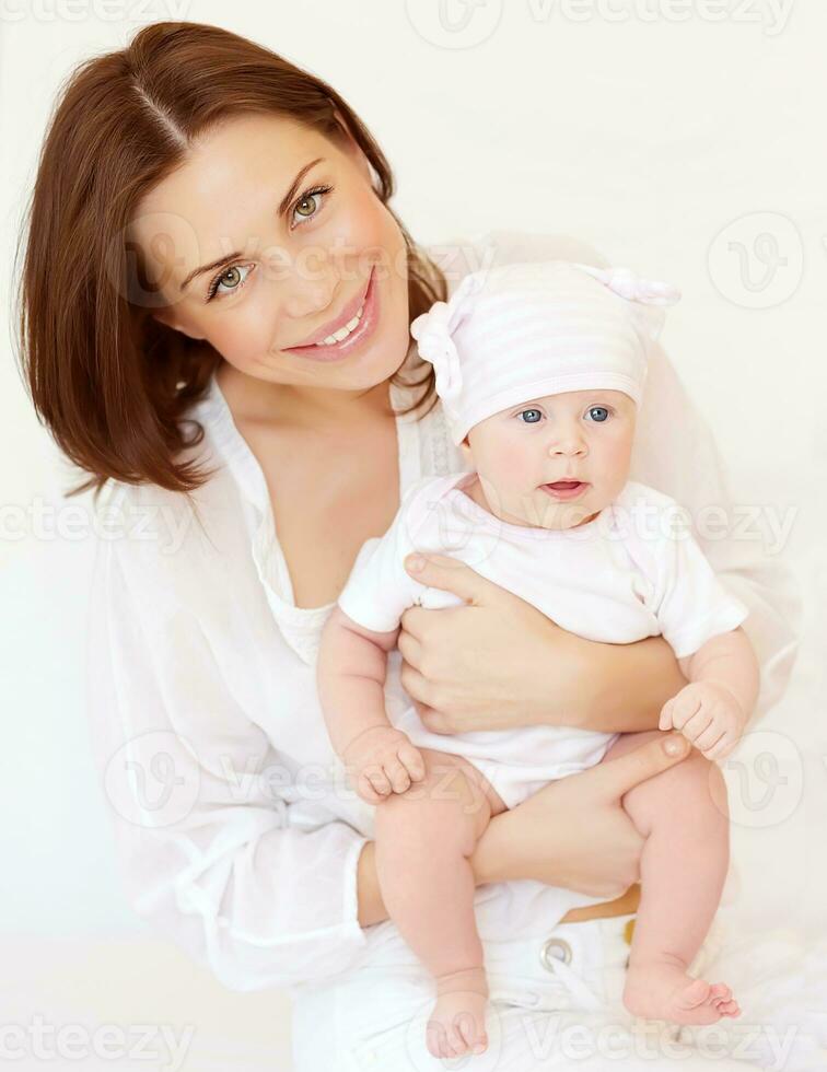 Young mother with newborn baby photo