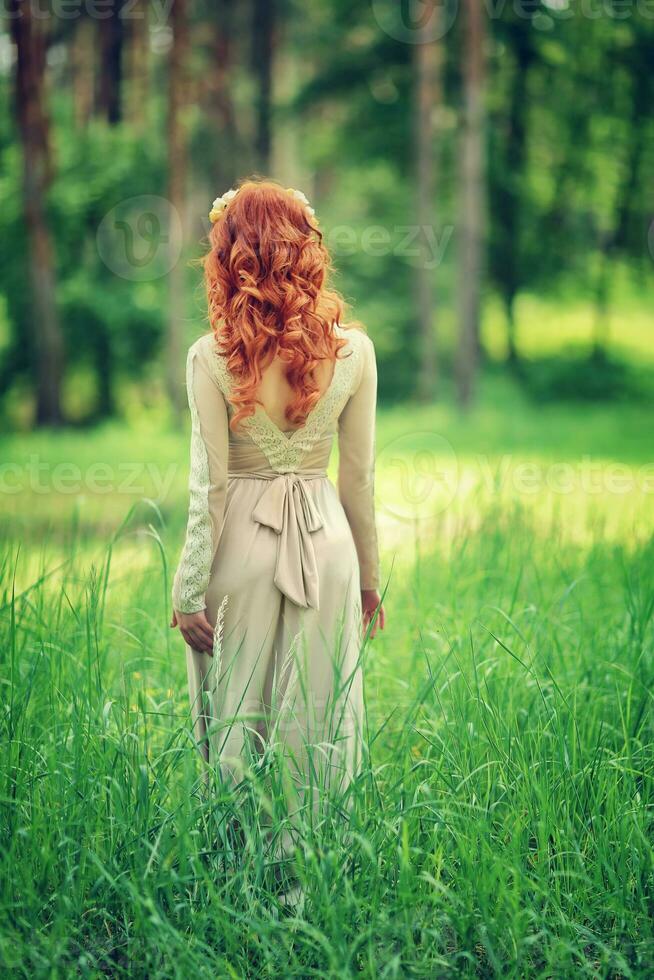 Gentle woman in the forest photo