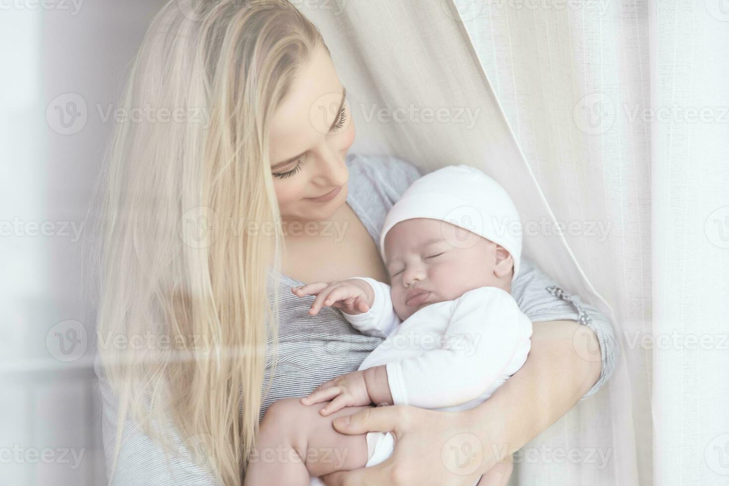 Happy mother with a baby photo