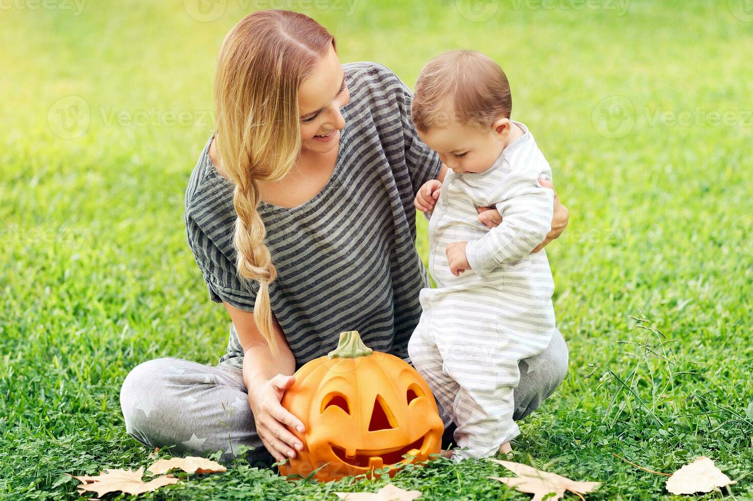 Happy family celebrating Halloween photo