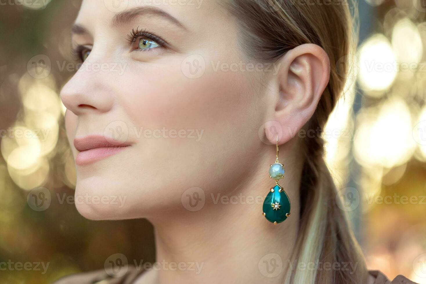 Beautiful Woman Wearing Gorgeous Earring photo