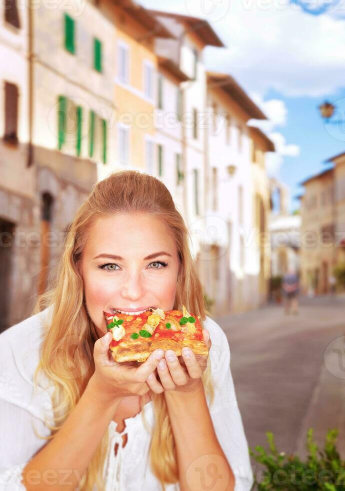 Eating Italian pizza photo