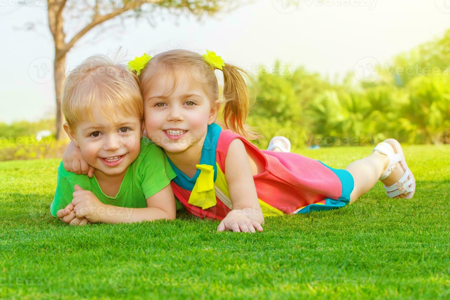 Two little kids in park photo