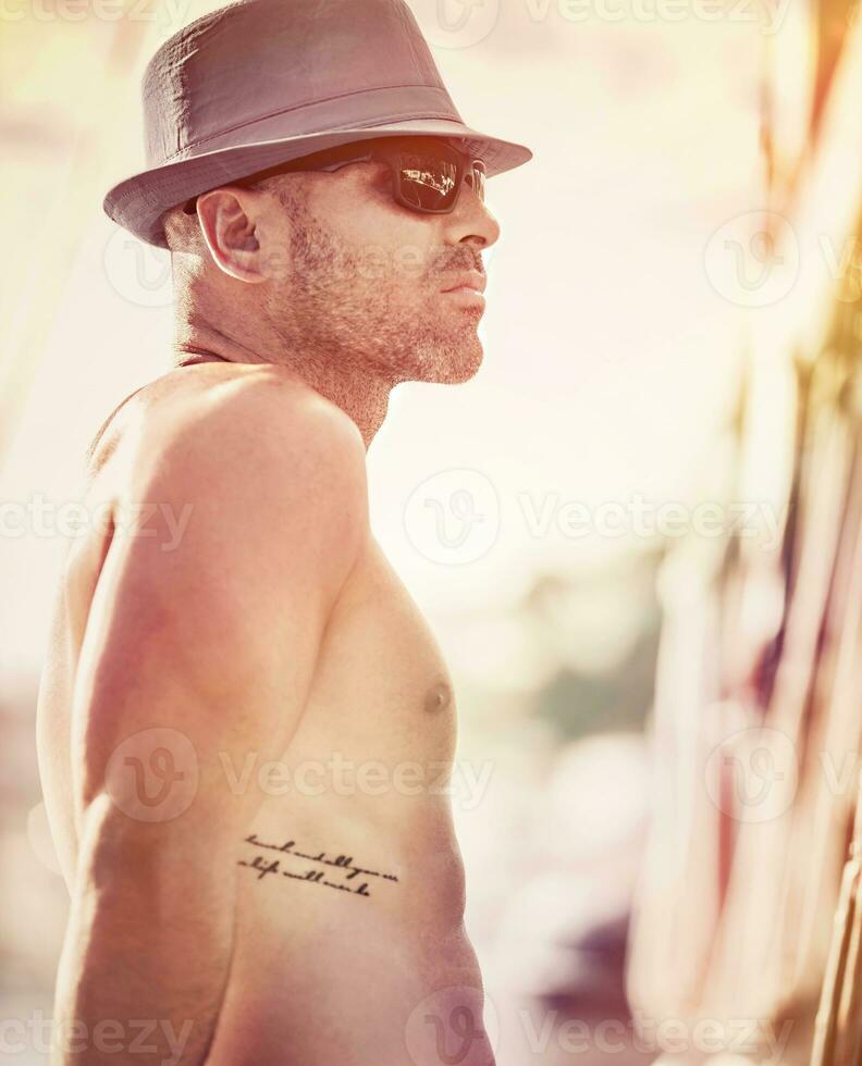 Sexy sailor on sunset photo