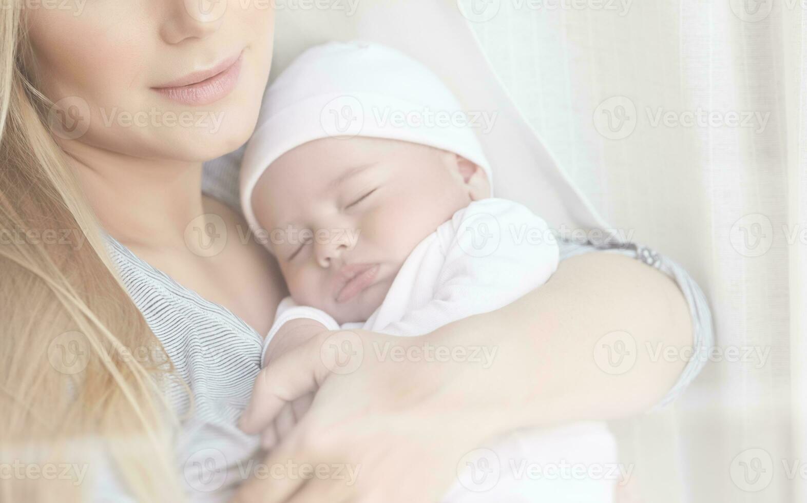 Gentle mother with baby photo