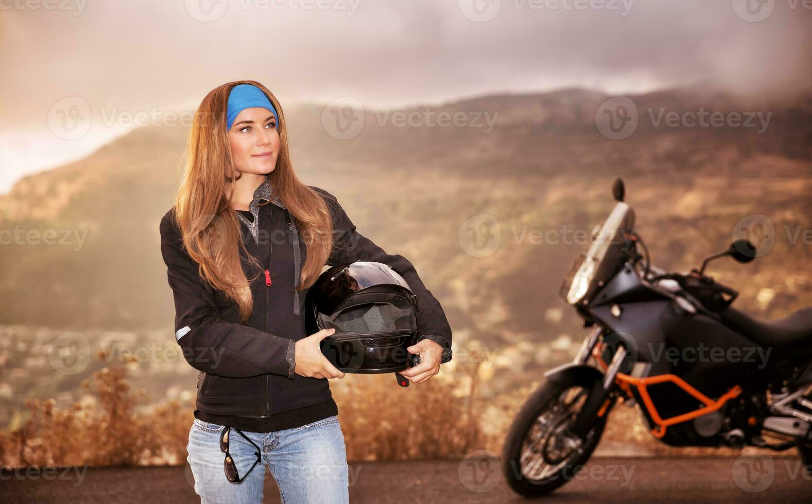 Beautiful biker girl photo