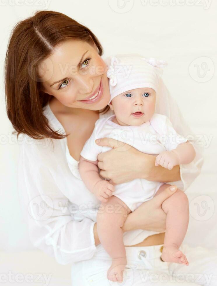 Happy mother with baby girl photo