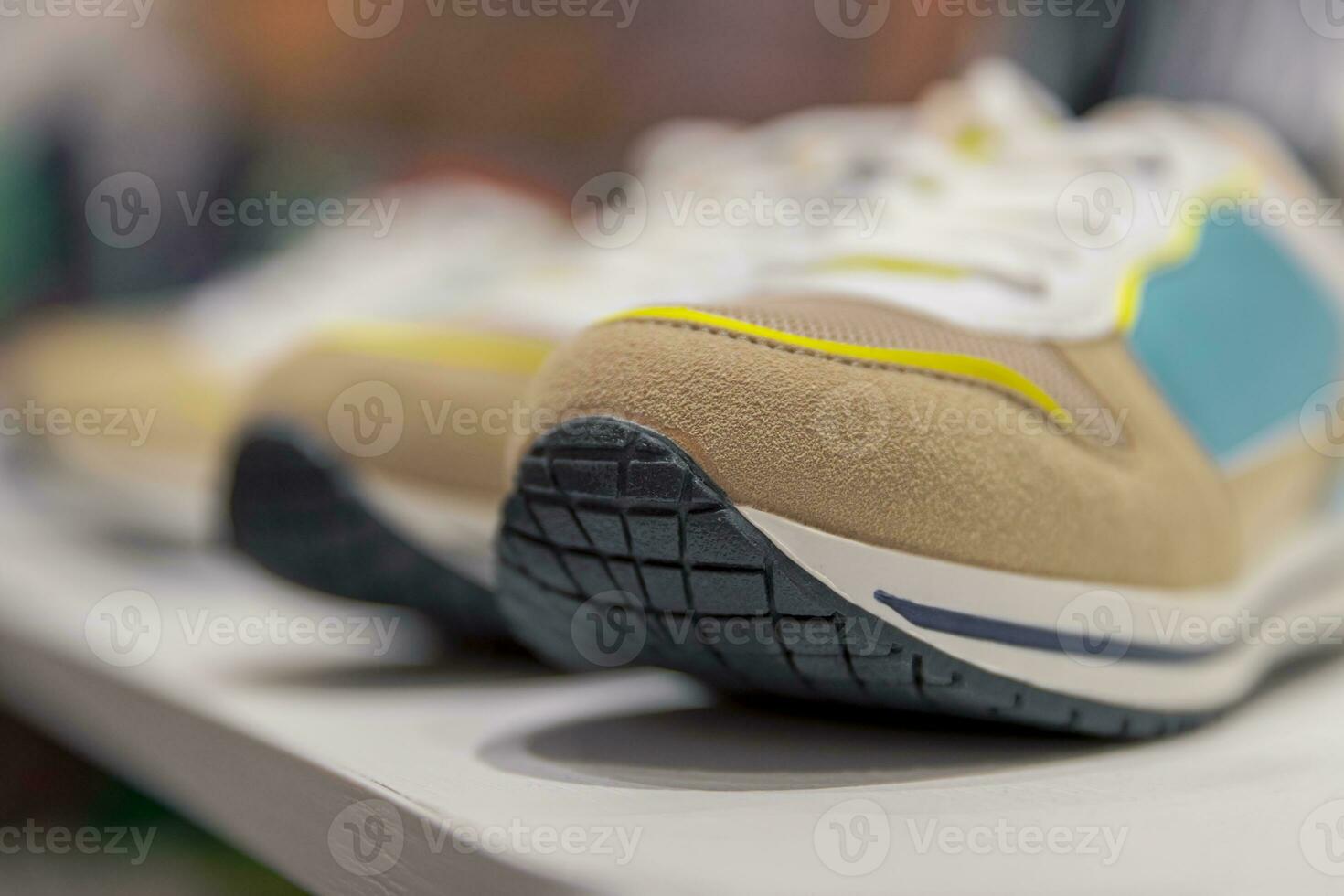 Beautiful stylish sneakers in the store photo
