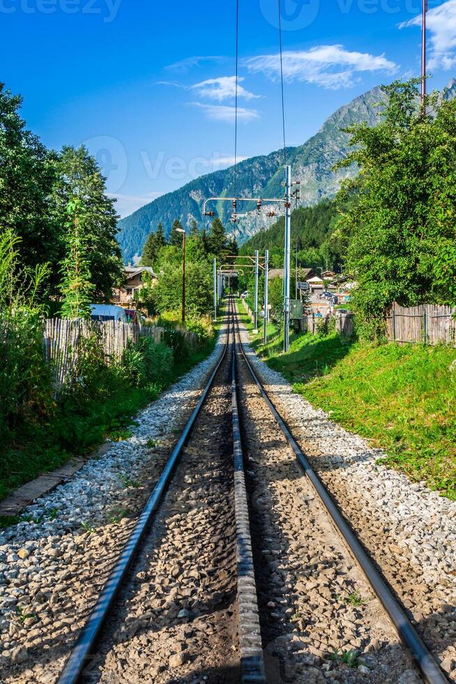 Railway tracks in a rural scene photo